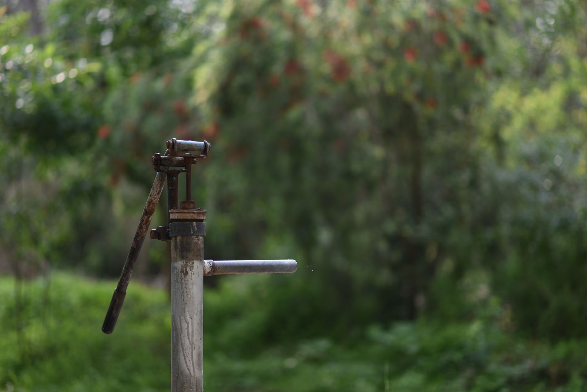 A drilling rig installing a water well in a rural off-grid property.